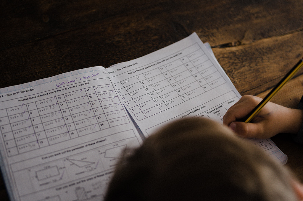 child doing school homework