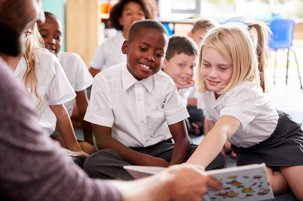 Group of Children reading and learning