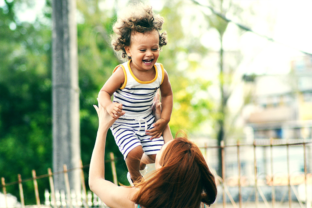 Child playing with an adult