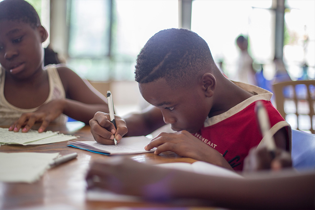 Child concentrates on studying